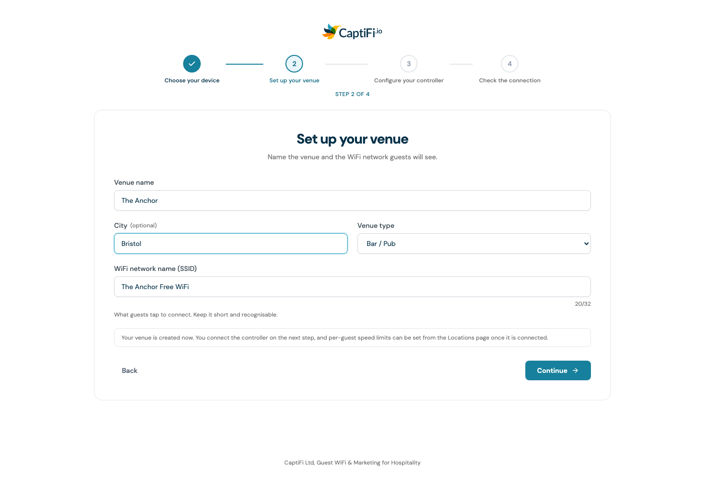 The set-up wizard venue step with the venue name, city, venue type and WiFi network name fields
