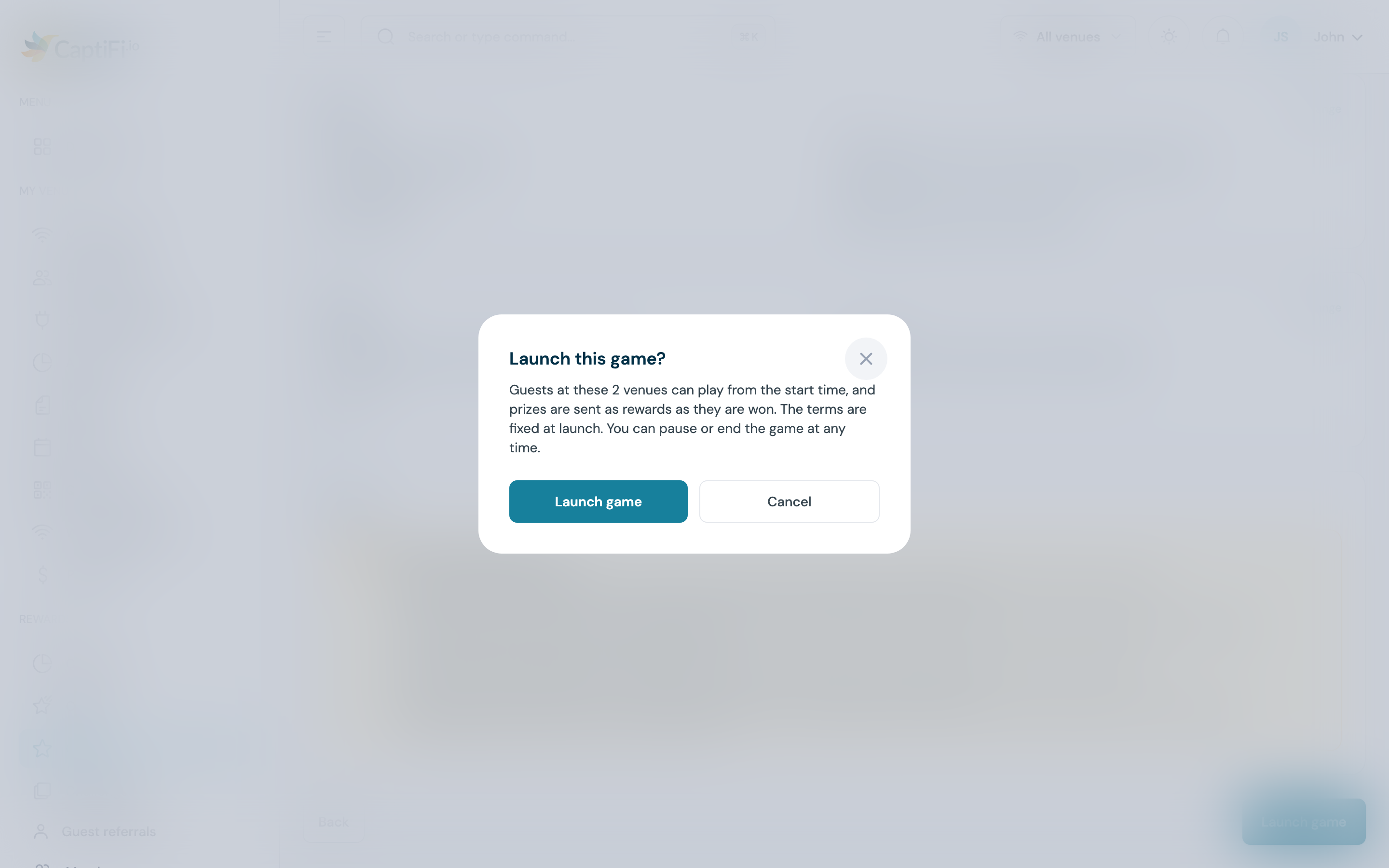 The Launch this game? dialog open over the Review and launch step, with the Launch game and Cancel buttons