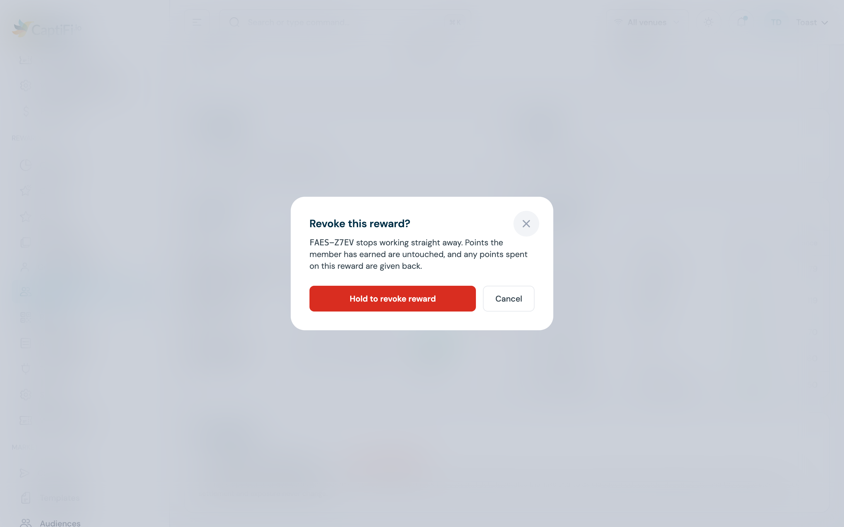 Revoke this reward? confirmation naming the code RNS2-MSJ1, with the Hold to revoke reward and Cancel buttons
