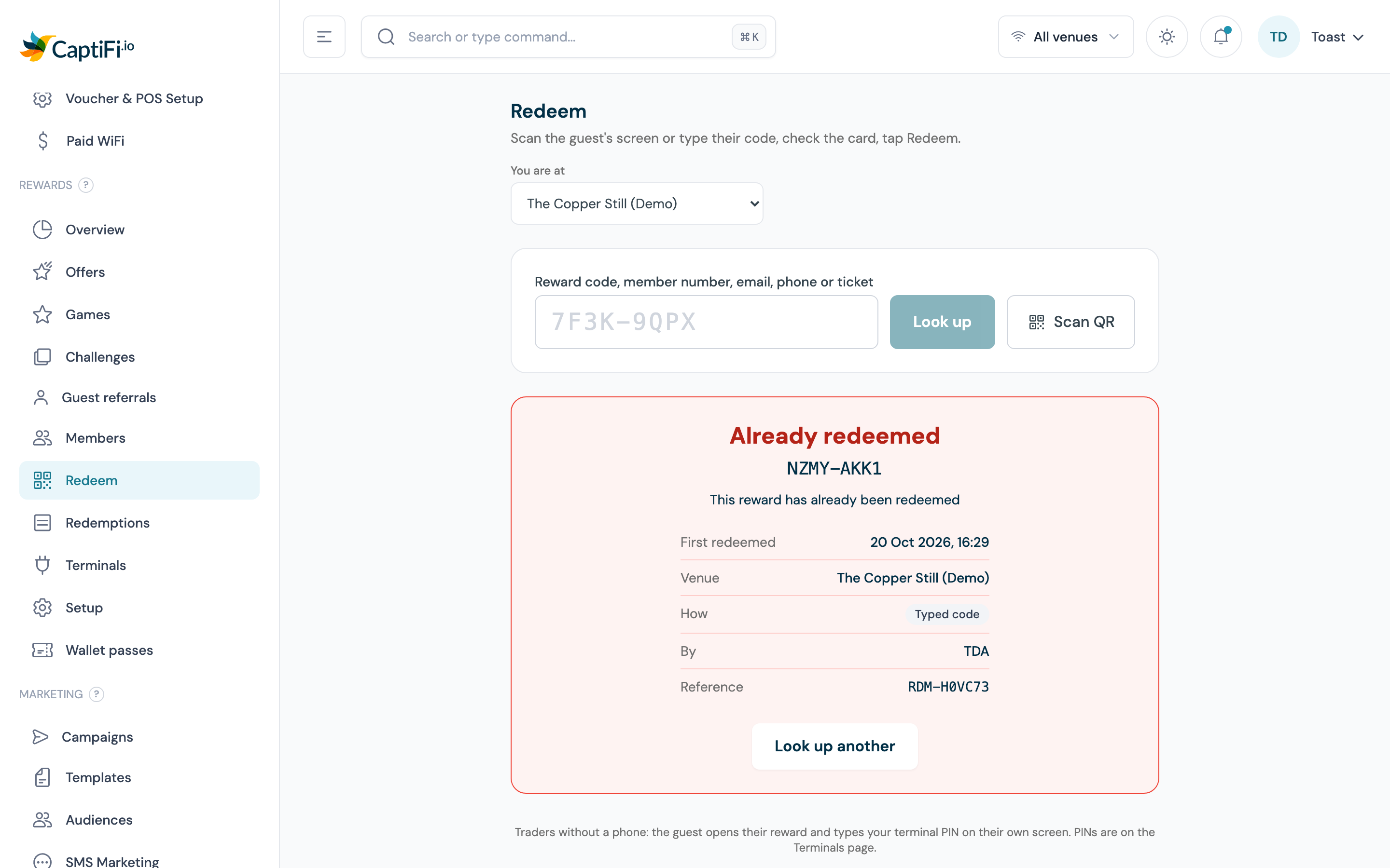 Already redeemed card for code RAA0-DPYE with the first redemption's time, the venue, How reading Typed code, the reference and the Look up another button
