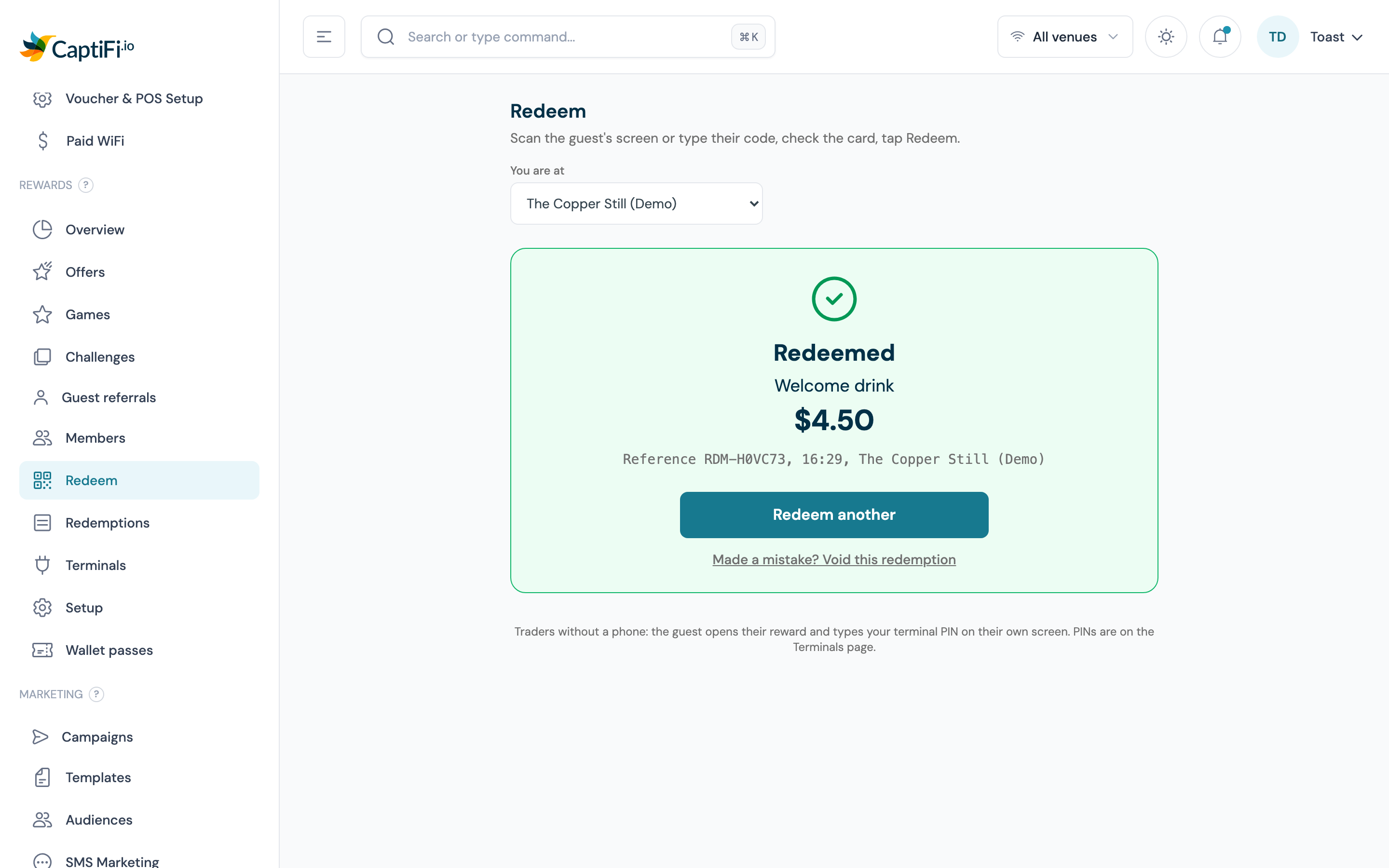 Green Redeemed screen on the Redeem page showing Welcome drink, the 4.50 value, the reference RDM-AJQR3M with the time and venue, the Redeem another button and the Void this redemption link