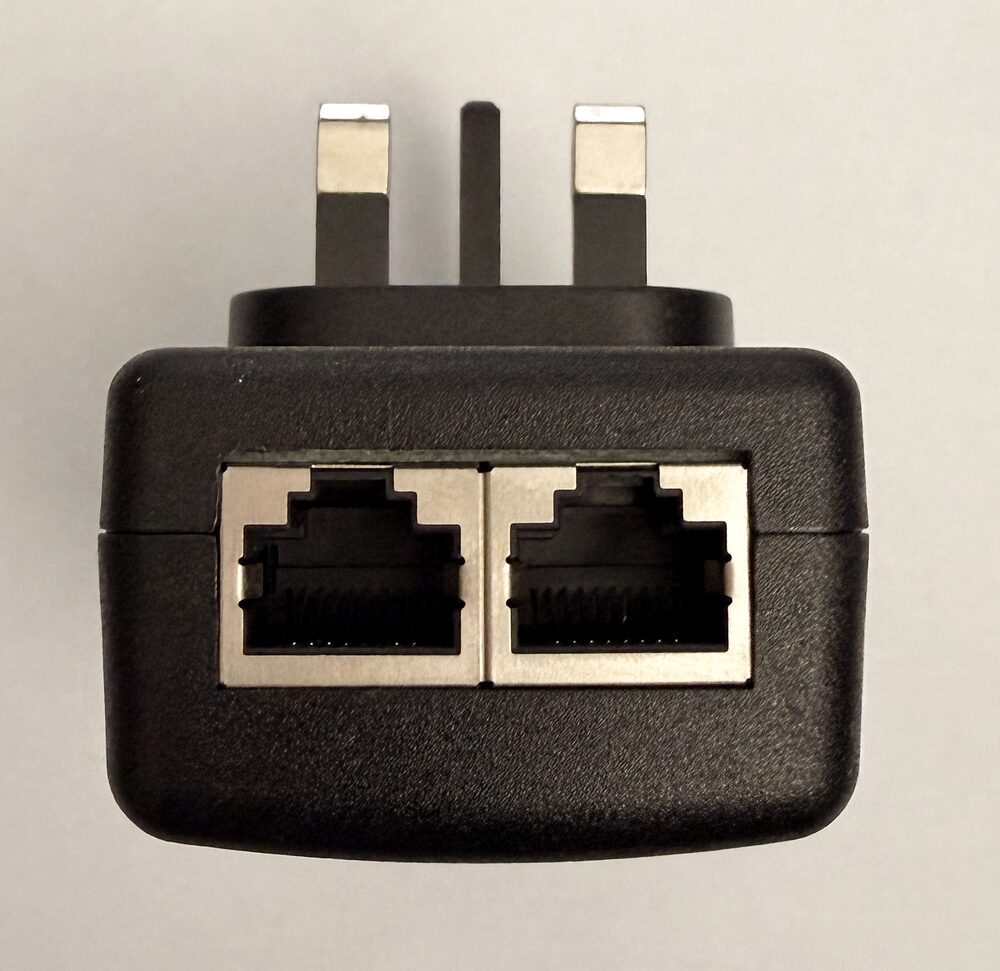 The PoE injector, showing its two Ethernet sockets, LAN and PoE
