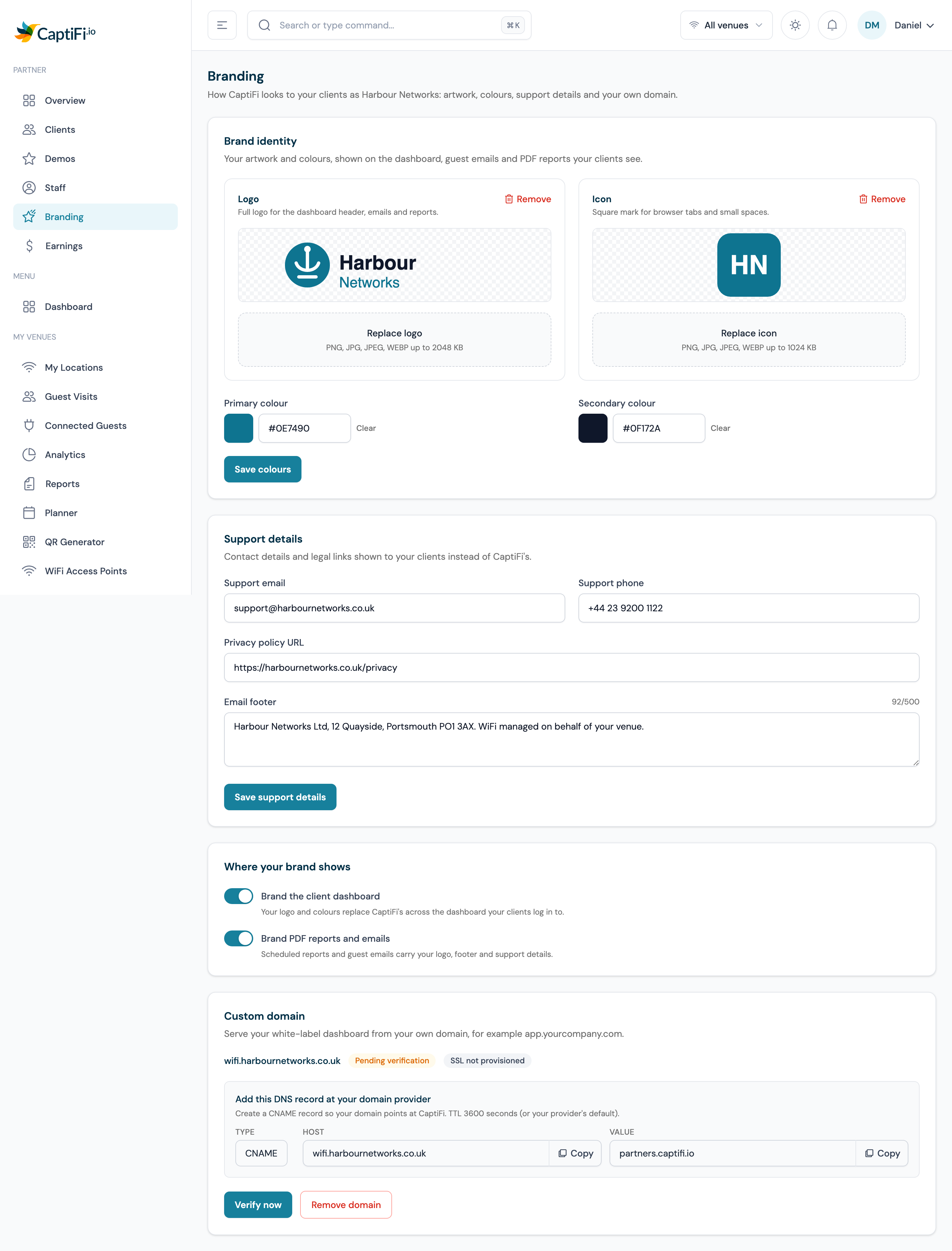 The Branding page on my.captifi.io with logo and icon uploads, brand colours, support details, the two branding toggles and the custom domain panel with its CNAME instructions